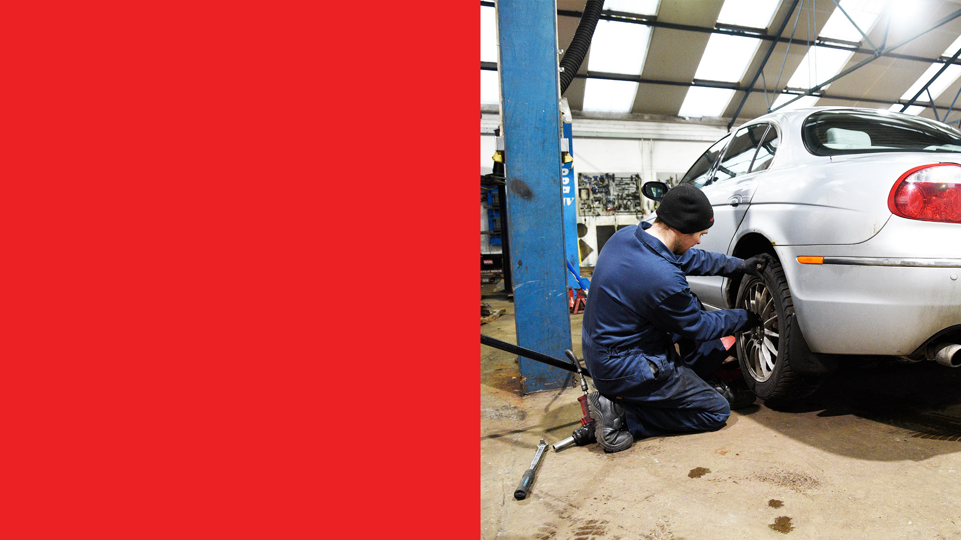 Mechanic fitting a tyre to a car at our Isle of Skye Garage